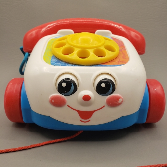 FisherPrice Toys Vintage Fisher Price Chatter Phone 200 Telephone Pull Toy W Moving Eyes